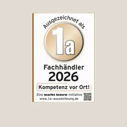 Siegel mit Text 1a Fachhändler 2026 und Kompetenz vor Ort